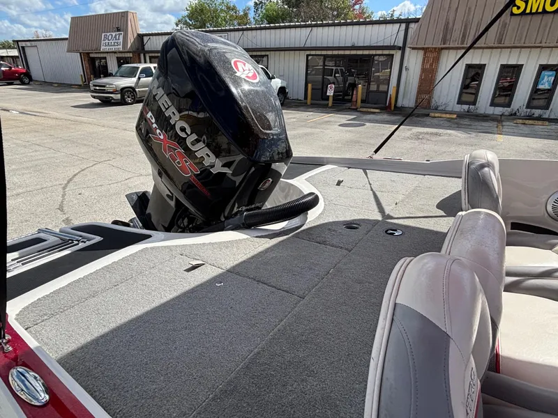 Slide: The Image of 2014 Nitro Z-7 boat with Mercury 150 L OptiMax Pro XS engine in parking lot. - 18