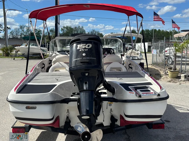Slide: The Image of 2014 Nitro Z-7 boat with 150 L OptiMax Pro XS engine and trailer, red canopy. - 3