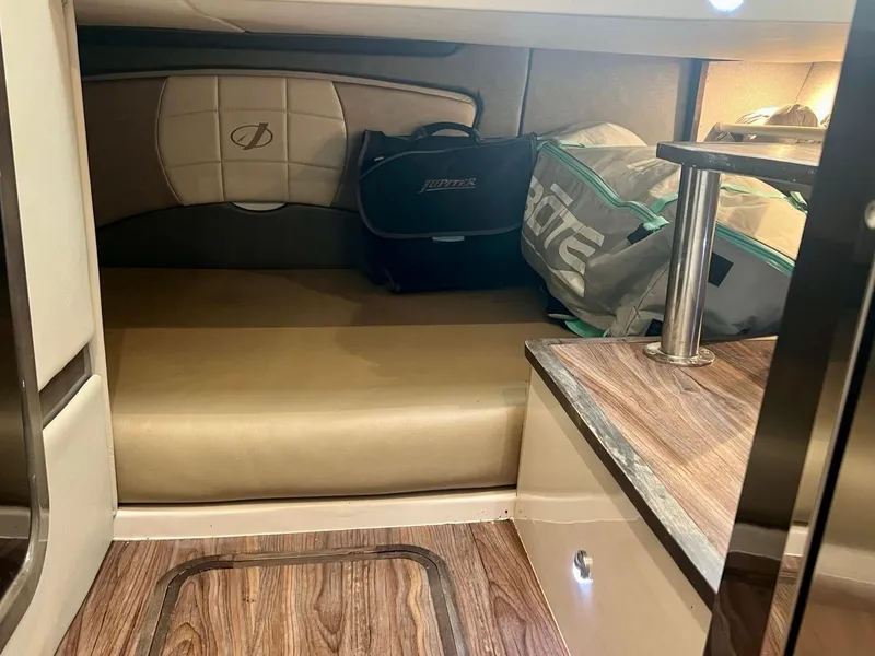 Slide: The Image of Interior cabin of 2016 Jupiter 34 LX boat with seating and storage bags. - 20
