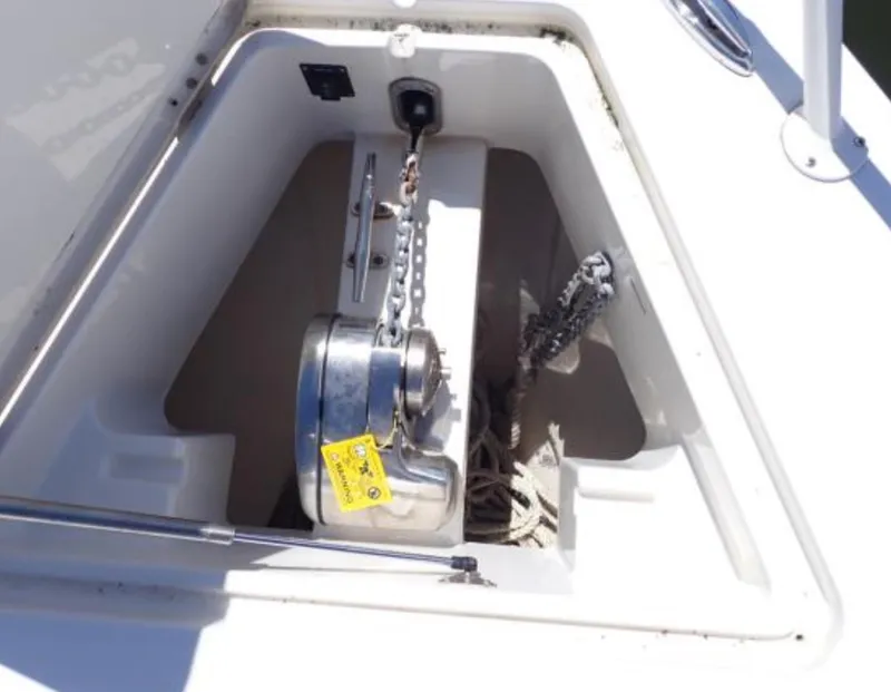 Slide: The Image of Anchor compartment of 2016 Jupiter 34 LX boat with chain and winch. - 3