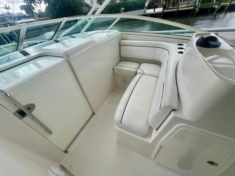 Slide: The Image of 2016 Jupiter 34 LX boat interior with white seating and sleek design. - 7