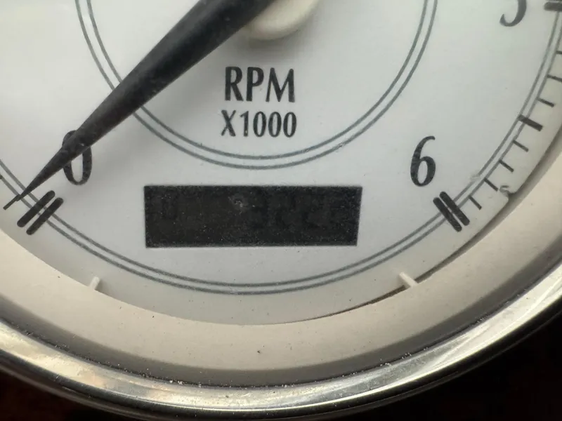 Slide: The Image of Close-up of a 2005 Regal 3560 Commodore RPM gauge, showing 0 RPM. - 26