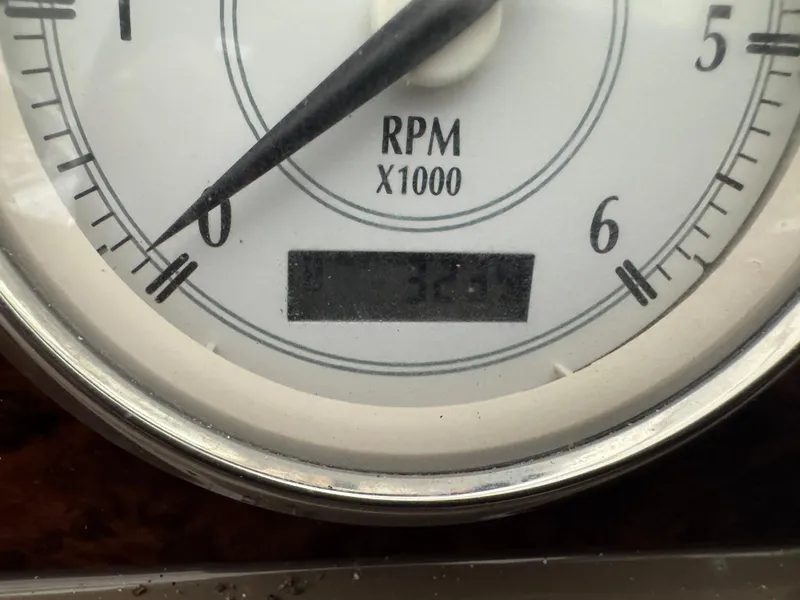 Slide: The Image of Close-up of a 2005 Regal 3560 Commodore tachometer showing RPM at 3.2. - 27