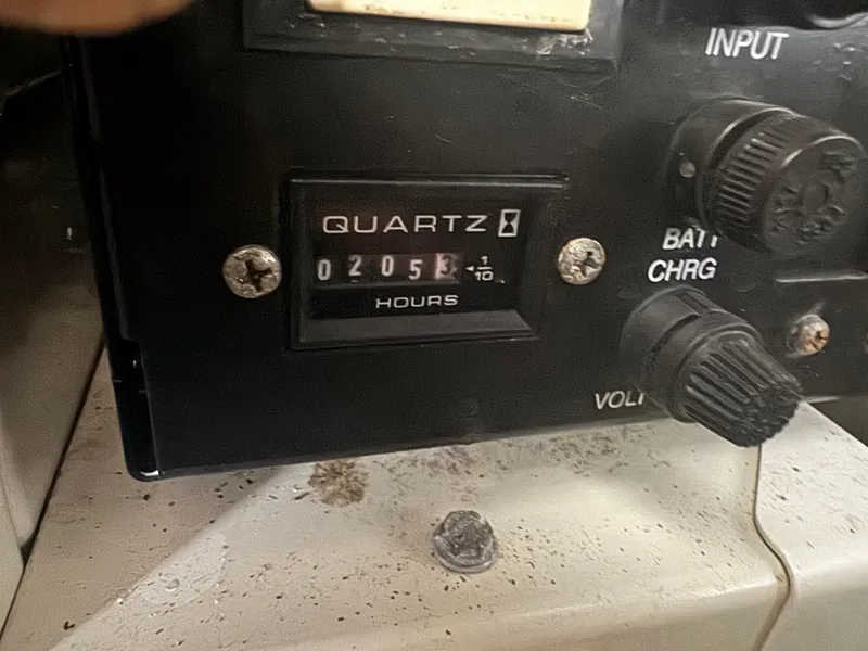 Slide: The Image of Hour meter reading 205.3 on a 2005 Regal 3560 Commodore boat. - 28