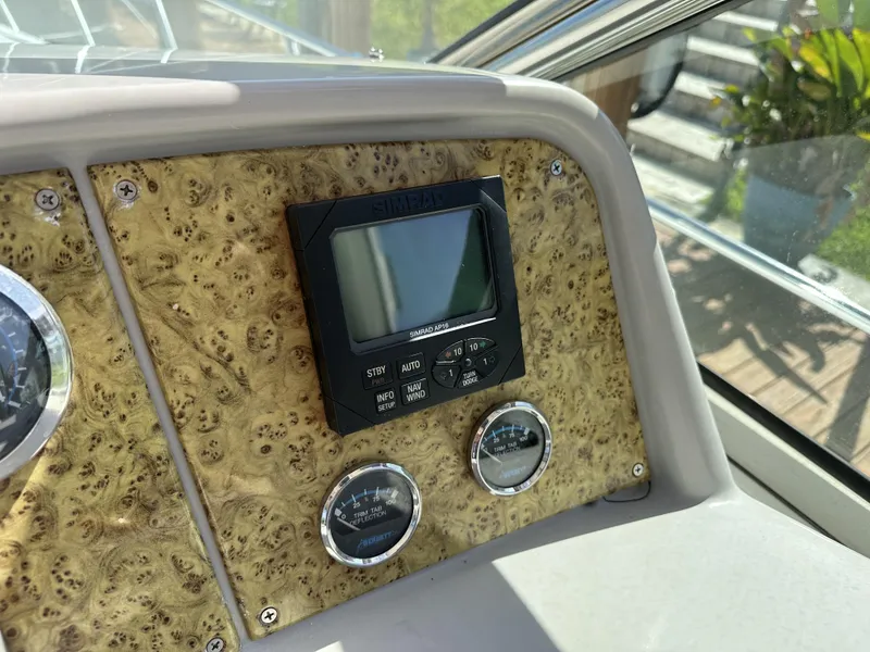 Slide: The Image of 2006 Formula 40 PC dashboard with control panel and gauges in sunlight. - 20