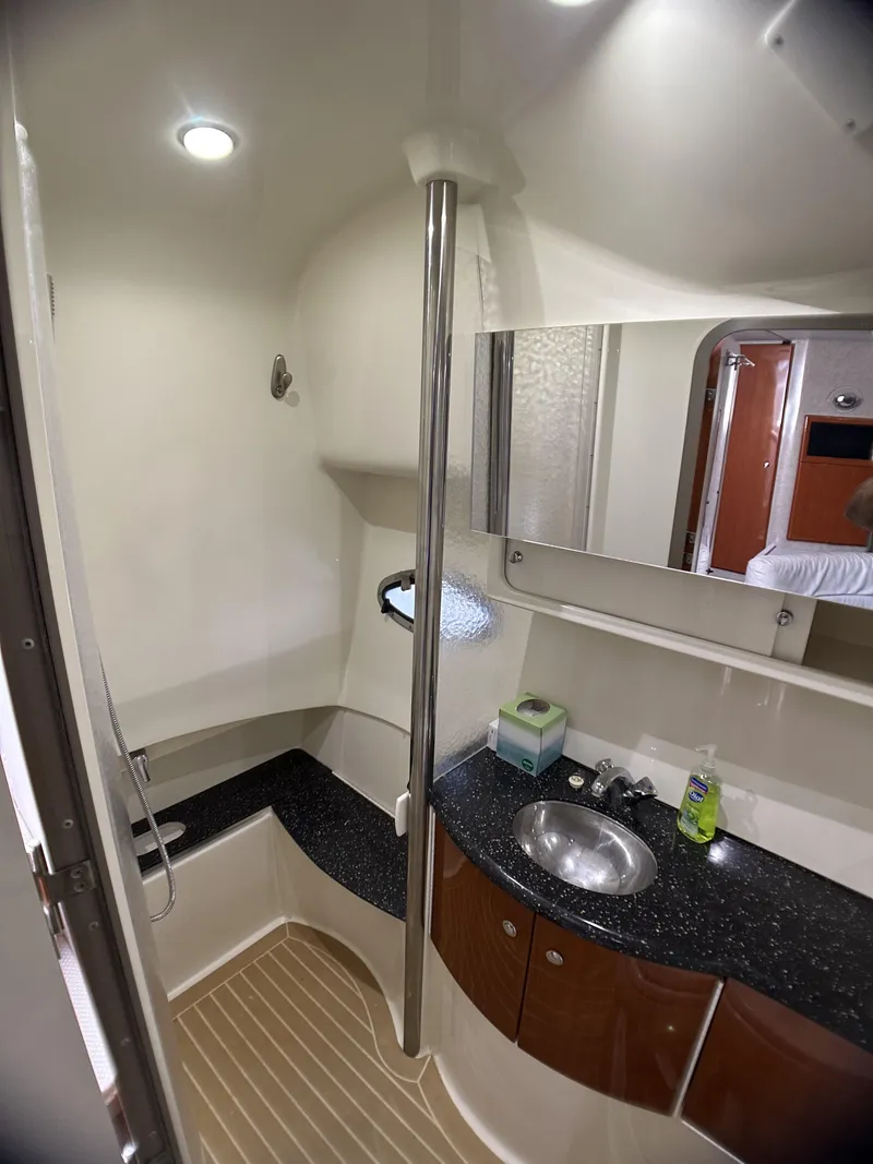 Slide: The Image of 2006 Formula 40 PC yacht bathroom with modern fixtures and sleek design. - 30