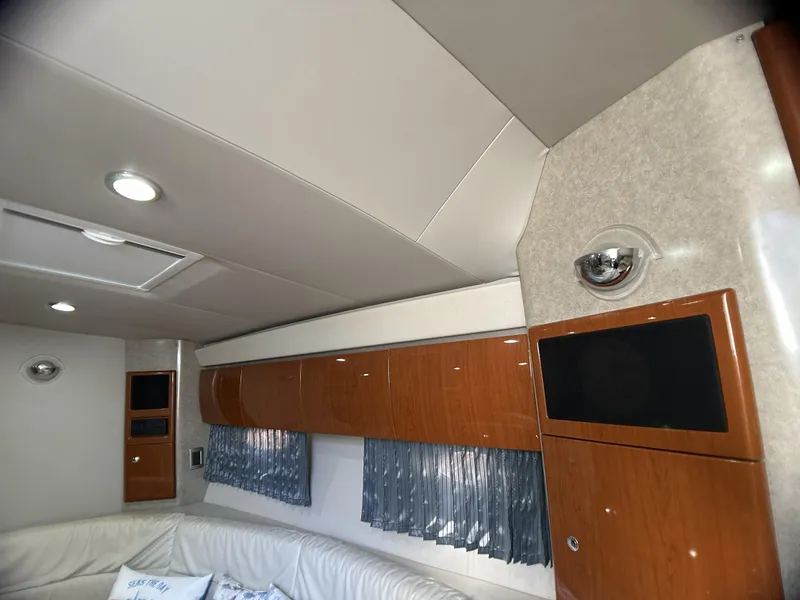 Slide: The Image of Interior of a 2006 Formula 40 PC yacht with wood cabinets and modern lighting. - 38