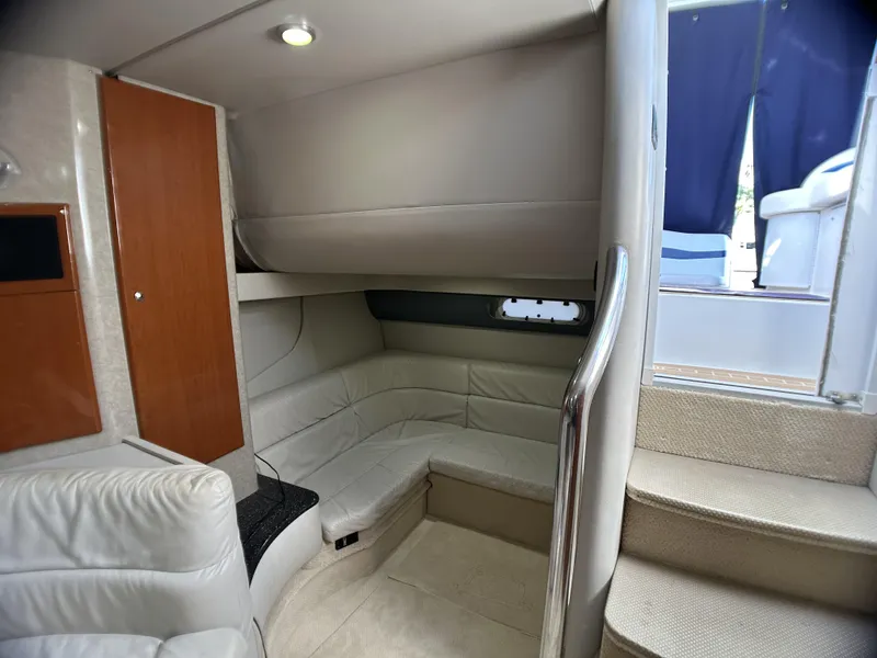 Slide: The Image of Interior of 2006 Formula 40 PC yacht with beige seating and stairs. - 41