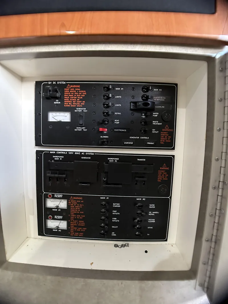 Slide: The Image of Control panel of a 2006 Formula 40 PC boat, featuring various switches and indicators. - 43
