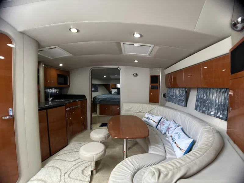 Slide: The Image of Luxurious interior of a 2006 Formula 40 PC yacht with modern furnishings and cozy seating. - 44