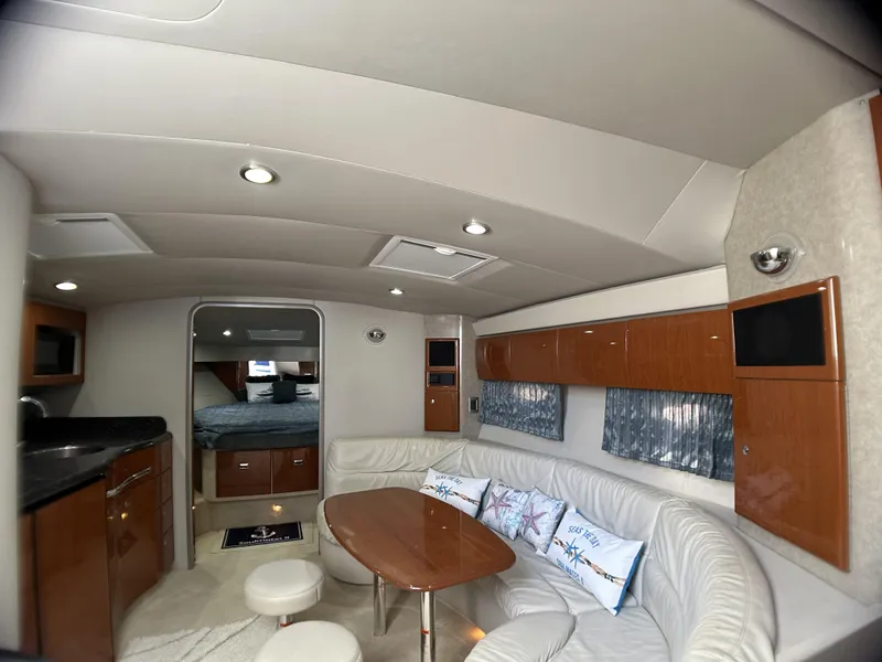 Slide: The Image of Luxurious interior of a 2006 Formula 40 PC yacht with modern furnishings and elegant design. - 45