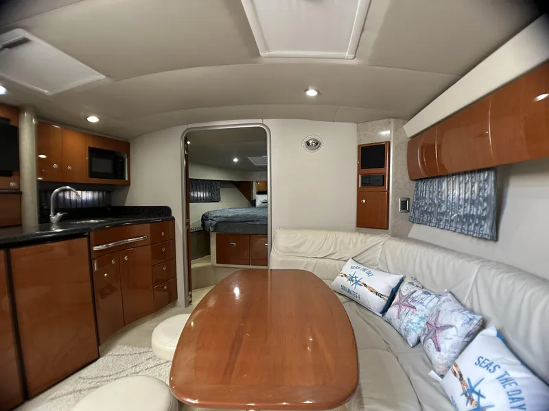 Slide: The Image of Luxurious interior of a 2006 Formula 40 PC yacht with modern amenities and elegant design. - 46