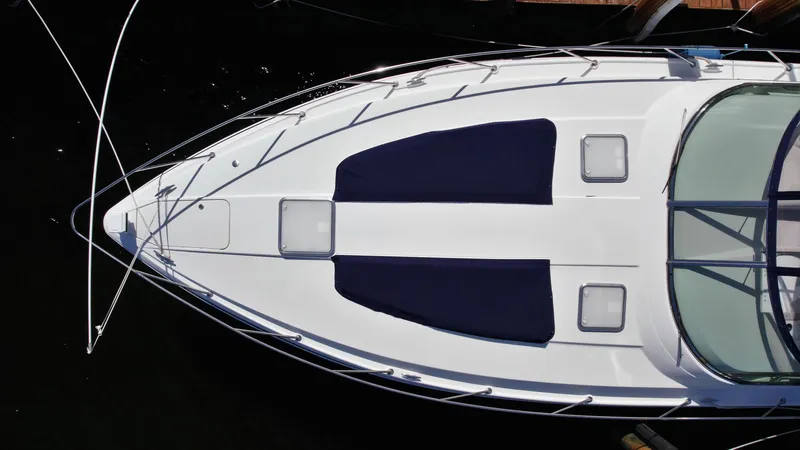 Slide: The Image of Overhead view of a 2006 Formula 40 PC yacht docked in water. - 7