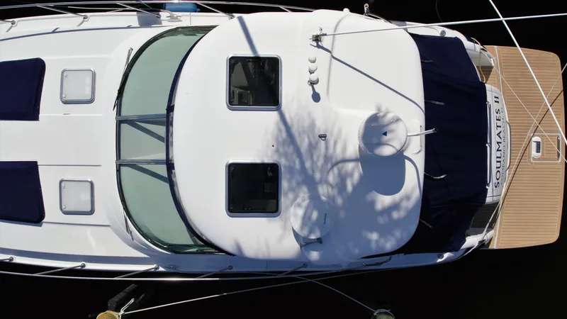 Slide: The Image of Overhead view of a 2006 Formula 40 PC yacht docked, showcasing its sleek design. - 8