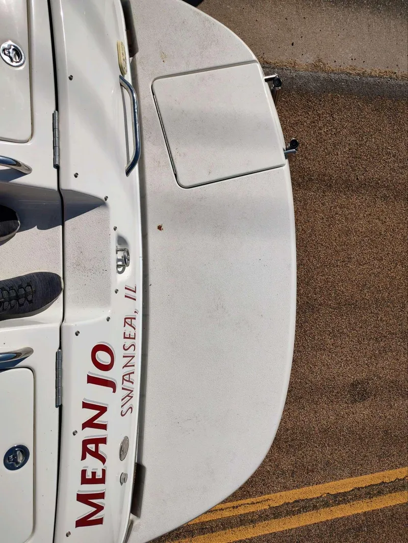 Slide: The Image of Crownline 270 BR boat, 2006 model, with "Mean Jo" and "Swansea, IL" text on the stern. - 3
