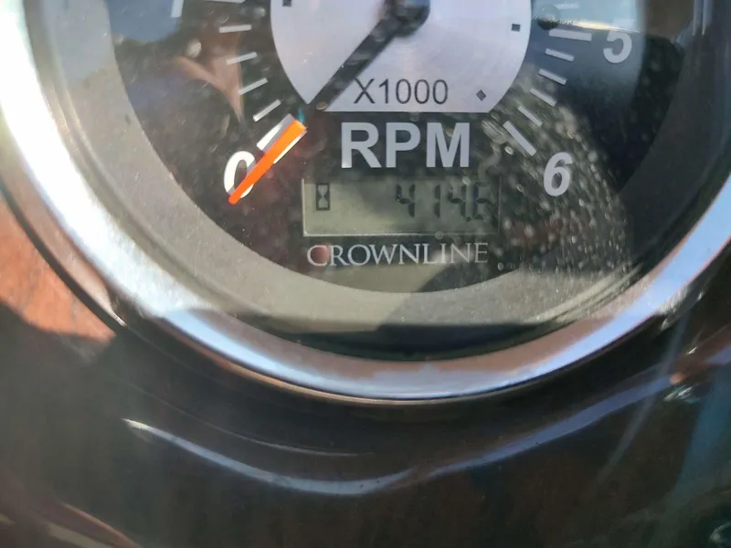 Slide: The Image of Close-up of 2006 Crownline 270 BR RPM gauge displaying 4140 RPM. - 5