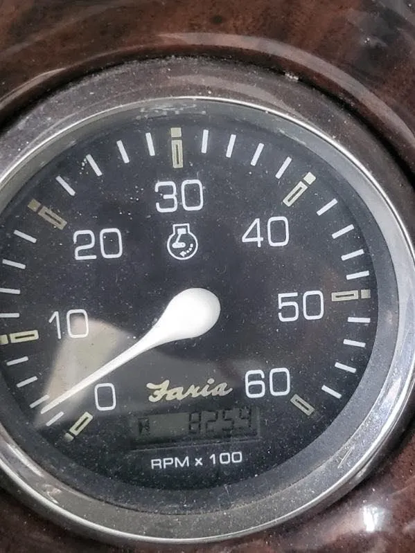 Slide: The Image of Close-up of a Faria tachometer gauge on a 2001 Crownline 248 BR boat. - 13