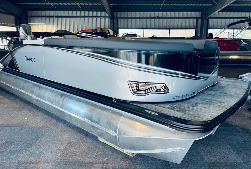 The Image of 2025 Tahoe Pontoon LTZ Versatile Rear Bench in showroom, showcasing sleek design and modern features. - 0