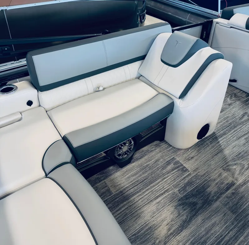 Slide: The Image of 2025 Tahoe Pontoon LTZ Versatile Rear Bench with sleek, modern seating design. - 7