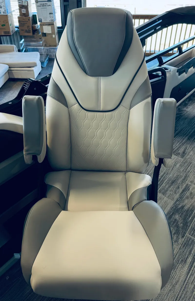 Slide: The Image of 2025 Tahoe Pontoon LTZ Versatile Rear Bench seat, luxurious design, beige upholstery. - 9