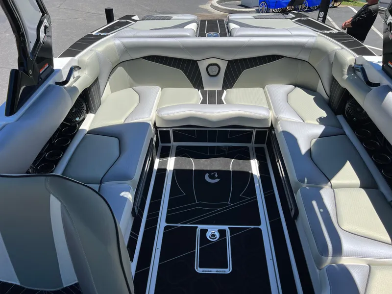 Slide: The Image of 2024 Centurion Fi23 boat interior with luxurious seating and modern design. - 11