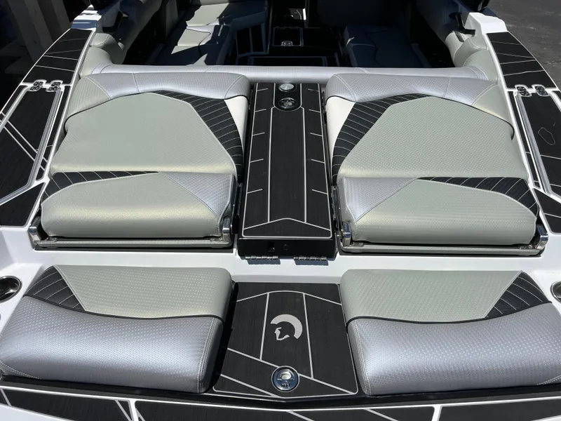 Slide: The Image of 2024 Centurion Fi23 boat interior with sleek, modern seating design. - 19