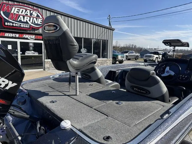 Slide: The Image of 2016 Triton 189 TRX boat at Wieda's Marine dealership, featuring comfortable seating. - 3