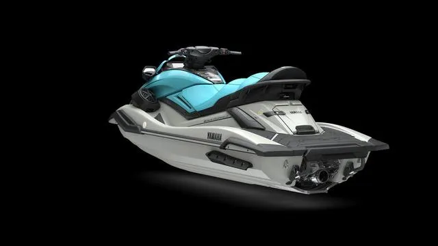Slide: The Image of 2025 Yamaha Waverunner FX Cruiser HO, sleek design, turquoise and white, rear view. - 4