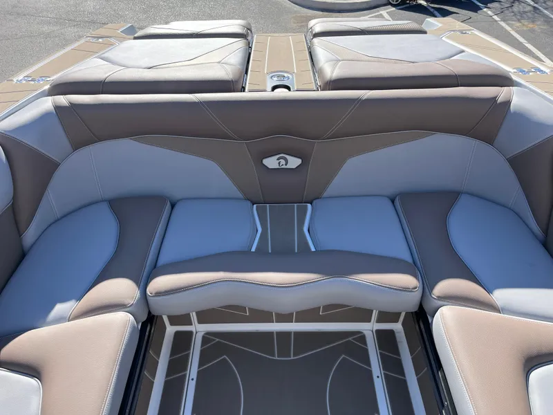 Slide: The Image of 2025 Centurion Fe25 boat interior with cushioned seating and modern design. - 15