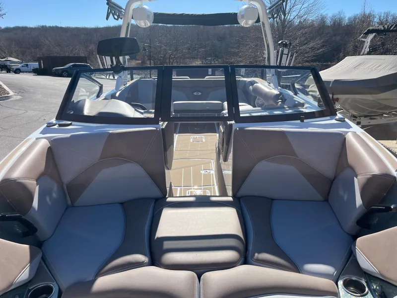 Slide: The Image of 2025 Centurion Fe25 boat interior with plush seating and sleek design. - 26