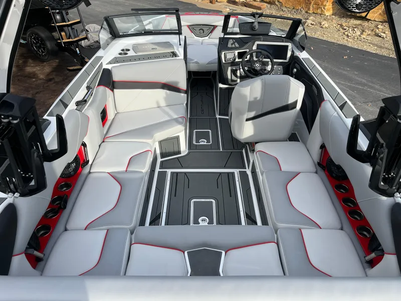 Slide: The Image of 2025 Centurion NV233 boat interior with modern seating and sleek design. - 19