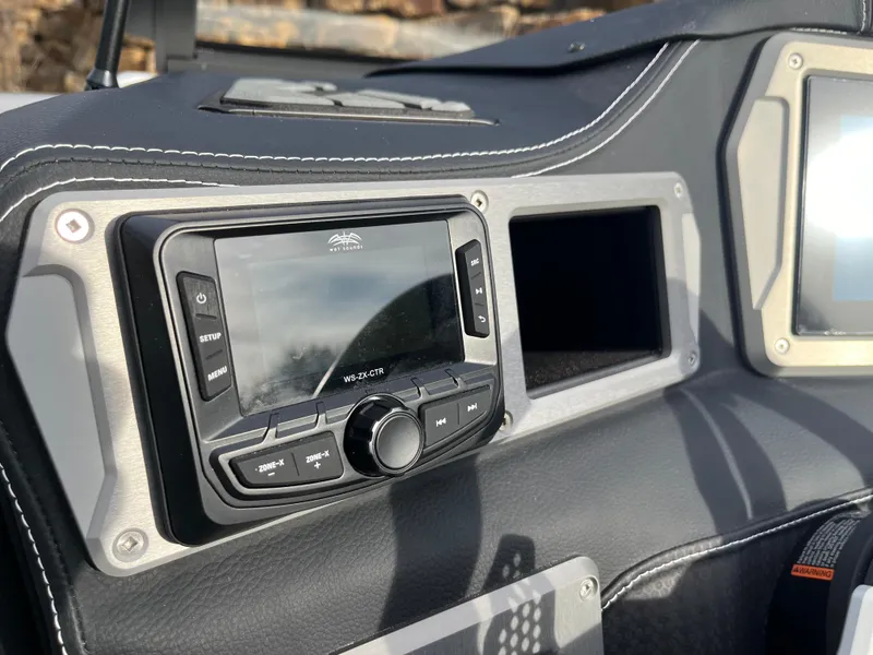 Slide: The Image of Dashboard of 2025 Centurion NV233 with modern control panel and display. - 21