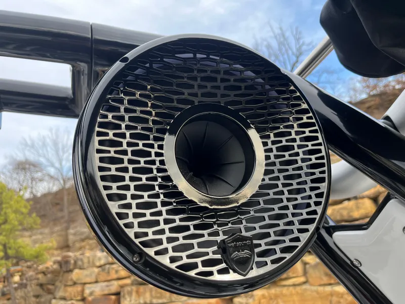 Slide: The Image of 2025 Centurion NV233 speaker detail with sleek black grille design. - 27