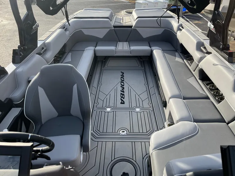 Slide: The Image of 2025 Moomba Makai boat interior with spacious seating and modern design. - 21