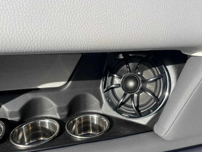 Slide: The Image of 2025 Moomba Makai interior speaker and cup holders, featuring sleek design and modern materials. - 22