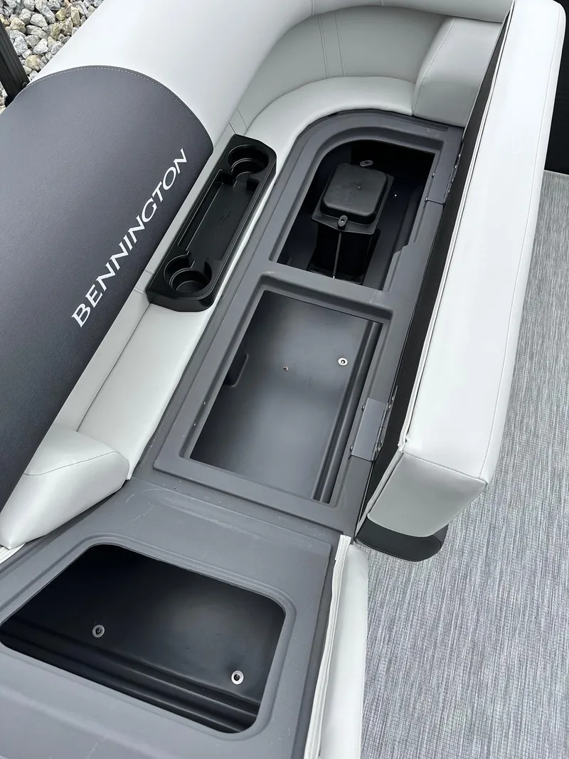 Slide: The Image of 2025 Bennington 22 SSR Quad Bench Tritoon interior storage compartments. - 15