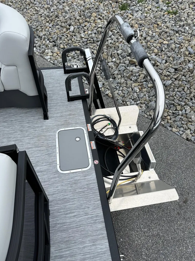 Slide: The Image of 2025 Bennington 22 SSR Tritoon deck with ladder and seating, featuring Yamaha F-150HP. - 16