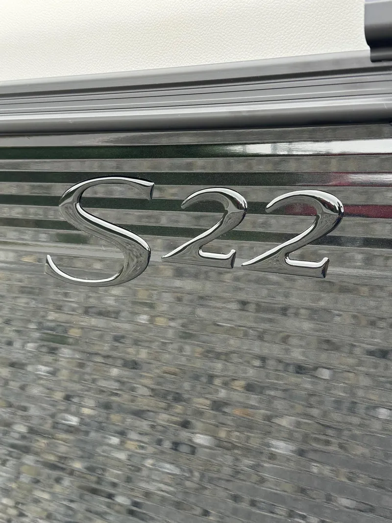 Slide: The Image of Close-up of Bennington S22 logo on 2025 SSR Quad Bench Tritoon. - 18