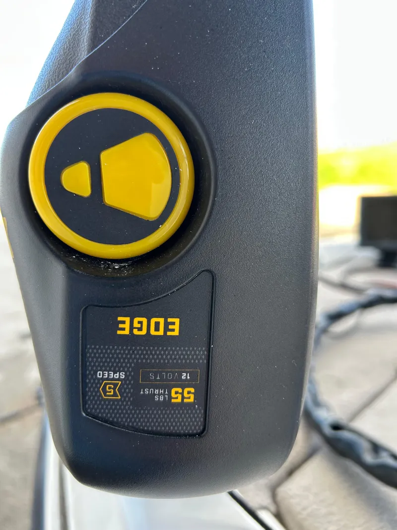 Slide: The Image of Close-up of a Skeeter 176 SL C 1998 boat control panel with yellow button. - 15