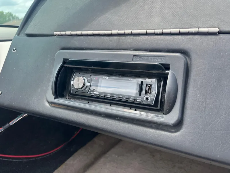 Slide: The Image of Pyle stereo system in 1998 Skeeter 176 SL C boat dashboard. - 48