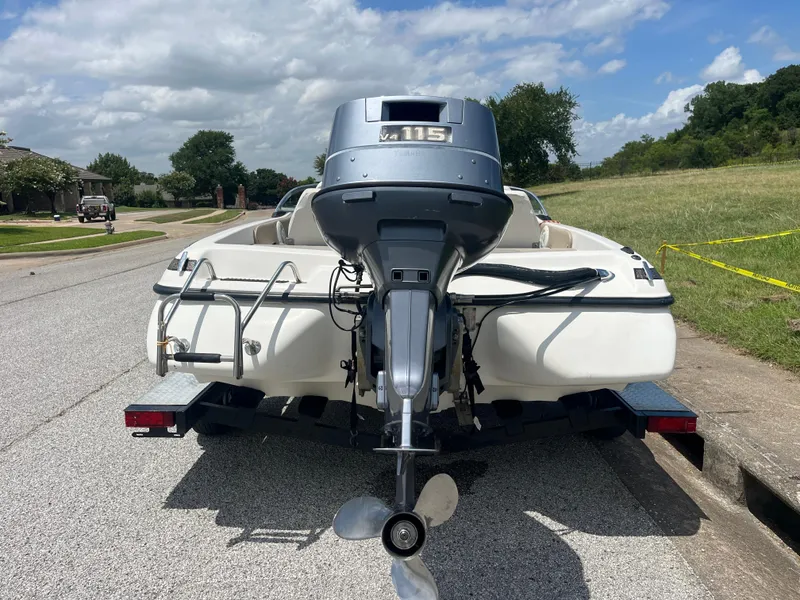 Slide: The Image of 1998 Skeeter 176 SL C boat with Yamaha 115 outboard motor on a trailer. - 6
