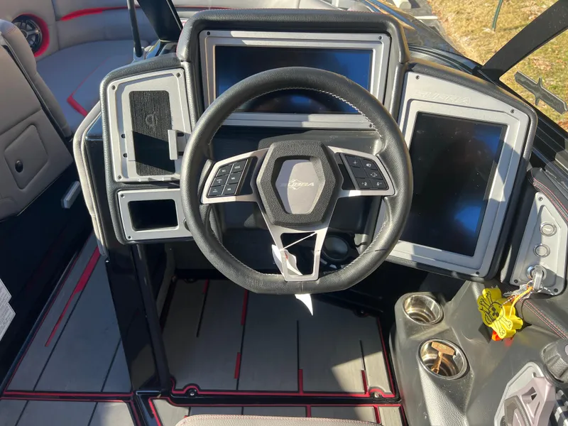 Slide: The Image of 2022 Supra SE dashboard with steering wheel and digital displays. - 16