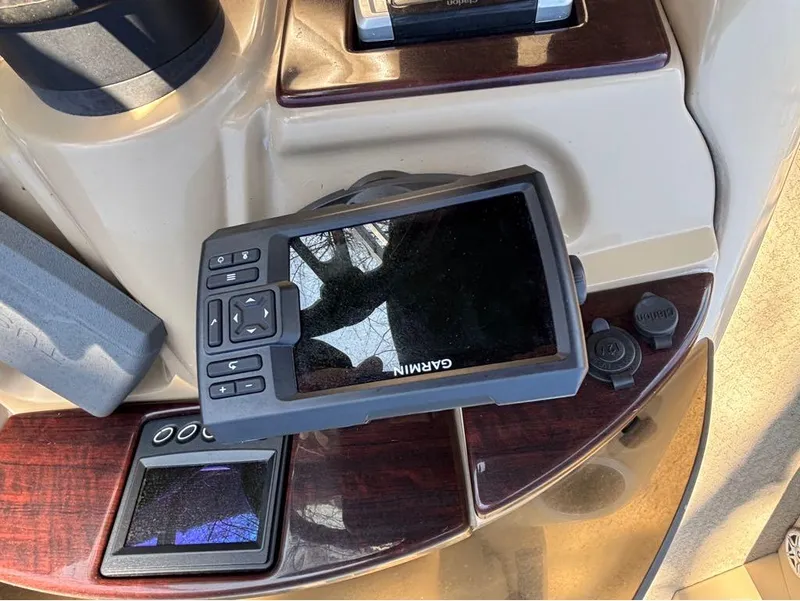 Slide: The Image of Dashboard of a 2014 South Bay 523E boat with Garmin navigation system. - 9