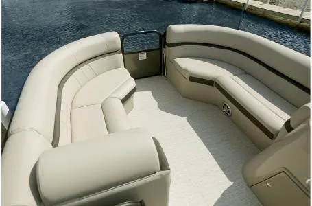 Slide: The Image of 2019 South Bay 200 Series 224RS 2.75 pontoon boat interior with beige seating. - 2