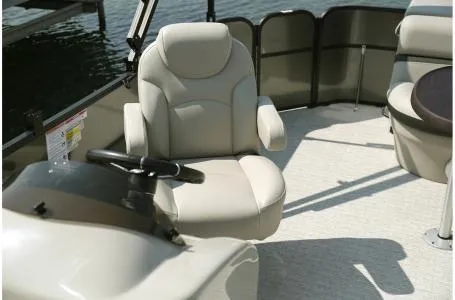 Slide: The Image of 2019 South Bay 200 Series 224RS boat interior with comfortable seating and steering console. - 3