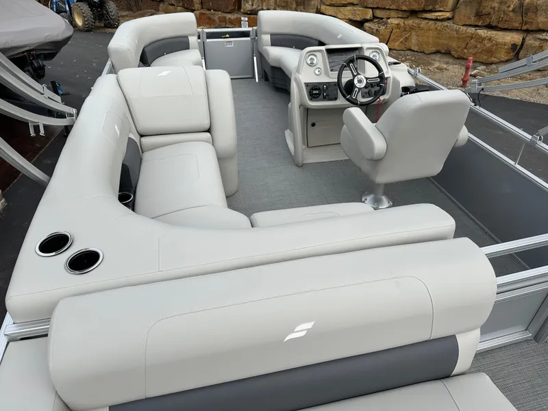 Slide: The Image of 2024 Starcraft LX 20 CB pontoon boat with spacious seating and modern helm. - 16