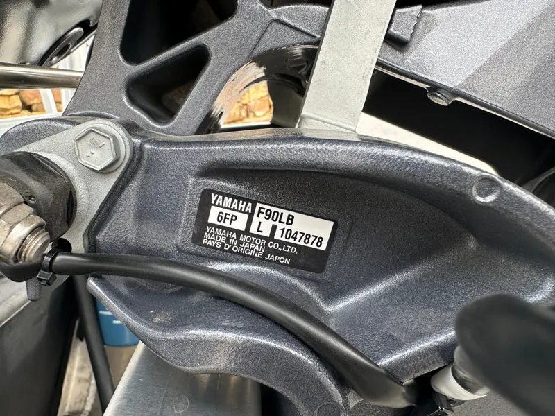 Slide: The Image of Close-up of Yamaha F90LB engine part on 2024 Starcraft LX 20 CB boat. - 20
