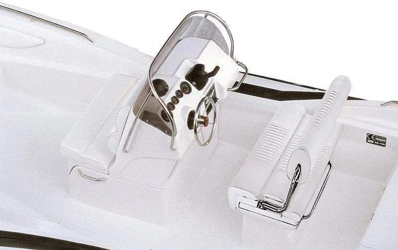 Slide: The Image of 2025 Zar Formenti 65 Suite boat interior with steering console and seating. - 23