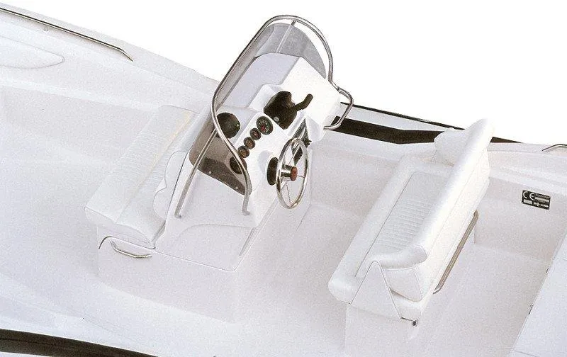 Slide: The Image of 2025 Zar Formenti 65 Suite boat interior with steering console and seating. - 24