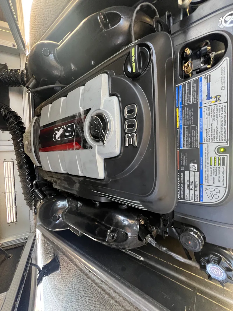 Slide: The Image of Engine of 2016 Bennington 2552 QCW I/O boat, showcasing 300 horsepower. - 17